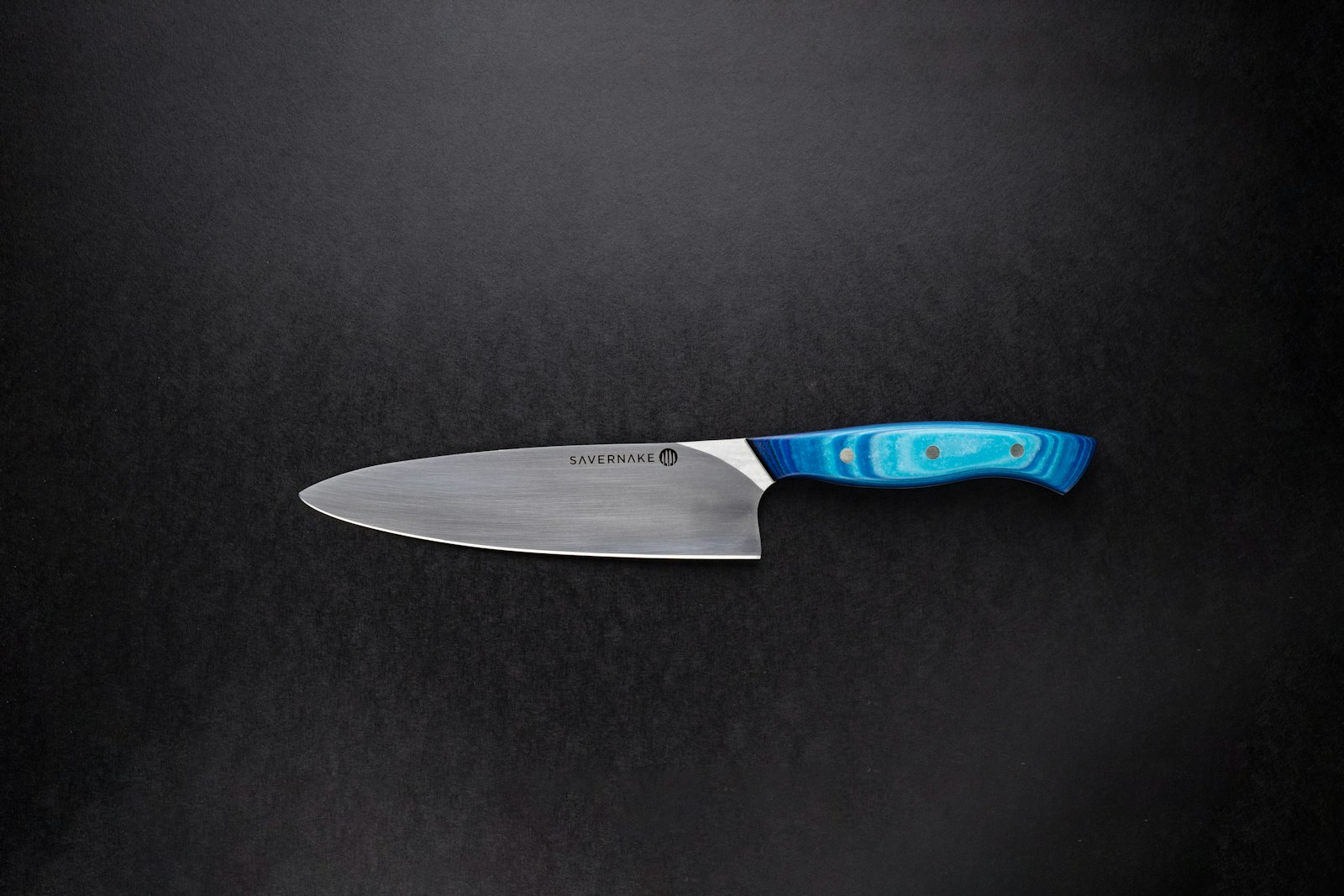Hand-made knife with red wooden handle